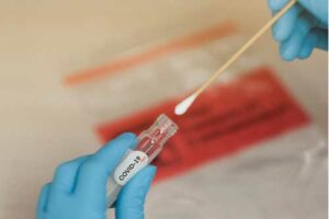 Covid-19 swab test, concept of Covid-19 and workers' comp