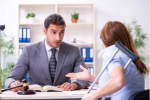 South Florida workers' comp attorney meeting young woman with crutches