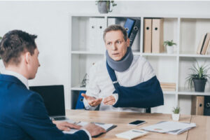 A Miami workers comp attorney meeting a client