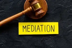 Workers Compensation Mediation Concept, Judge Gavel With Word Mediation