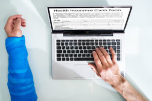 Injured Worker Filling Out Workers Comp Forms