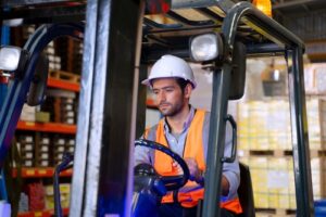 Worker Operating Forklift
