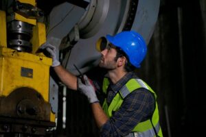 Worker Using Machinery