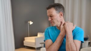 Man In Pain At Home