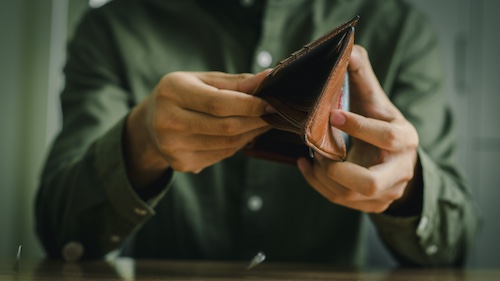 Man With Empty Wallet - Workers' Comp Benefits